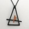 Triangular Pendant with seated figure