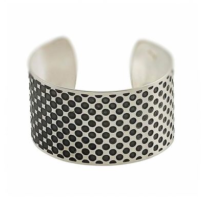 oxidised cuff bracelet flat on a white background