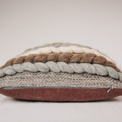Zipper detail of the handwoven rectangular 'Double Tendril' cushion featuring Blue-faced Leicester and Merino wool by Cassandra Sabo