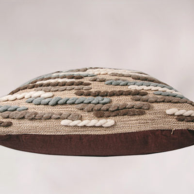 Zipper detail of the handwoven 'Caterpillar' cushion featuring Merino wool by Cassandra Sabo