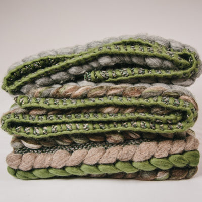 Blanket stitch detail of the handwoven 'Double Tendril' throw featuring blue-faced leicester wool by Cassandra Sabo