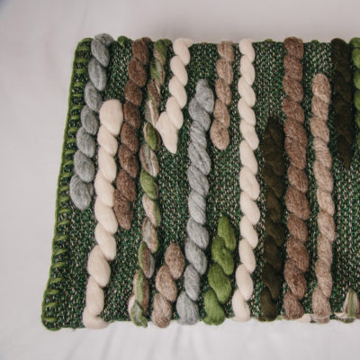 Cassandra Sabo’s handwoven merino wool 'Caterpillar' throw from her Forest Collection