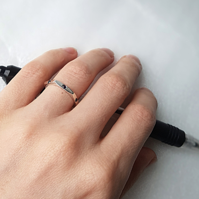 Women Hexagon Statement 925 silver ring with six sapphires is shown on the 4th finger of the white palm.