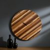 large circular striped mixed wood wall clock